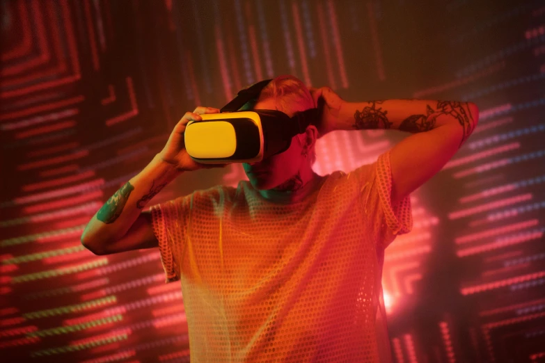 a man in a yellow shirt using a virtual reality device, inspired by Mike Winkelmann, pexels, interactive art, in a nightclub, pewdiepie, still from a music video, avatar image