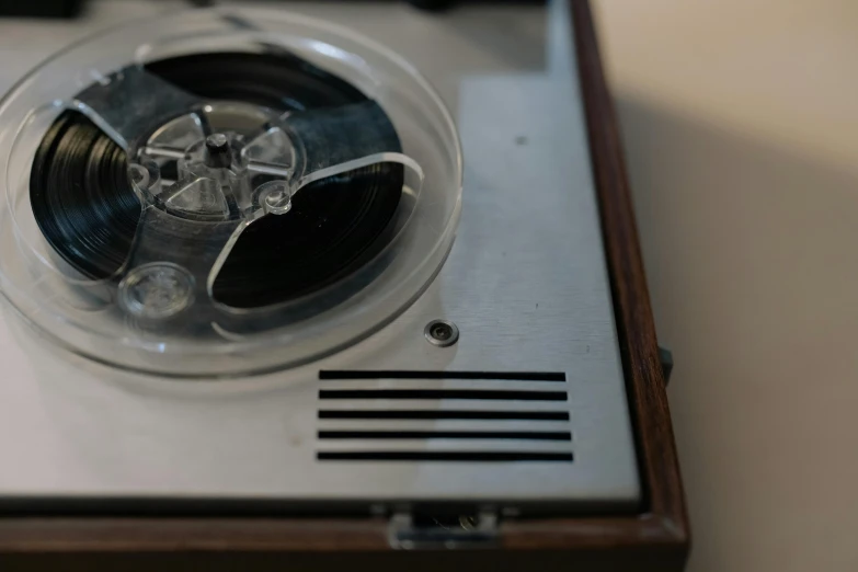 a record player sitting on top of a table, slide show, close up iwakura lain, ( dieter rams ), medium close - up ( mcu )