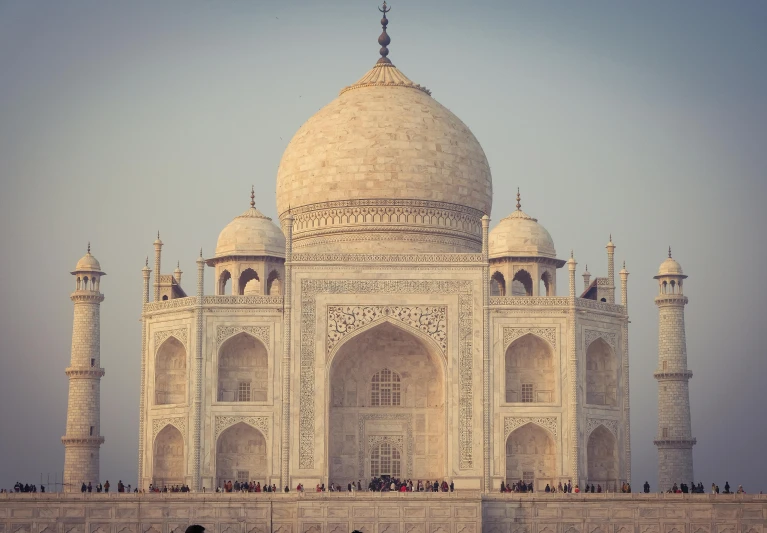 a group of people standing in front of a building, a marble sculpture, pexels contest winner, taj mahal made of cheese, thumbnail, grayish, brown