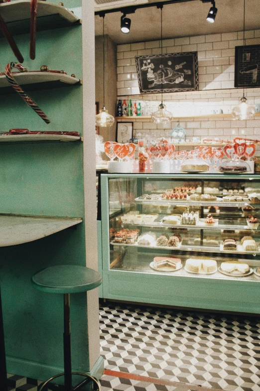 a bakery filled with lots of pastries and pastries, by Elsa Bleda, unsplash, art nouveau, sea - green and white clothes, 2 5 6 x 2 5 6 pixels, interior of a small, sweets