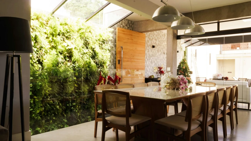 a dining room filled with lots of wooden furniture, pexels contest winner, light and space, vertical gardens, sao paulo, profile image, lush gardens hanging