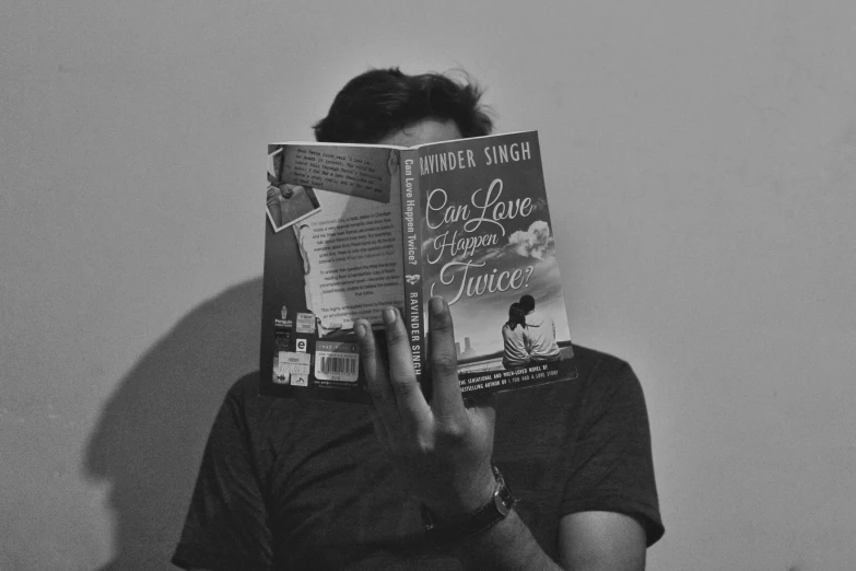 a black and white photo of a man reading a book, tumblr, in love selfie, cover art, only one face, an olive skinned