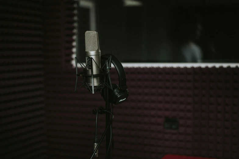 a close up of a microphone in a recording studio, an album cover, trending on pexels, avatar image, single portrait, modelling