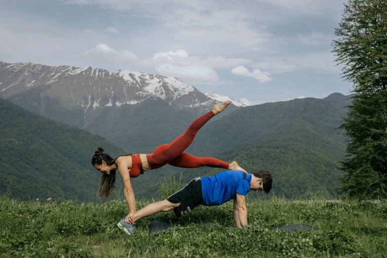 a man and a woman doing yoga in the mountains, by Edward Avedisian, pexels contest winner, ayanamikodon and irakli nadar, working out in the field, avatar image, thumbnail
