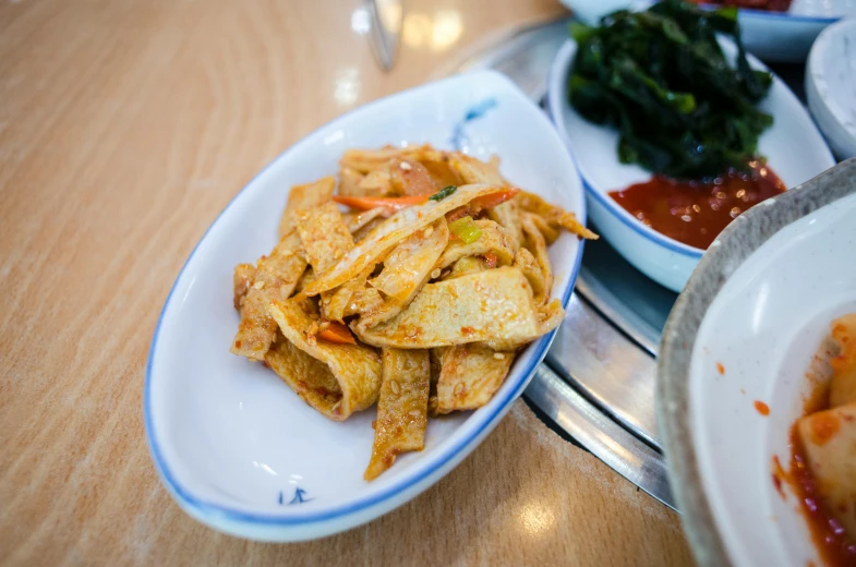 a close up of a plate of food on a table, unsplash, mingei, hong soonsang, square, battered, thumbnail