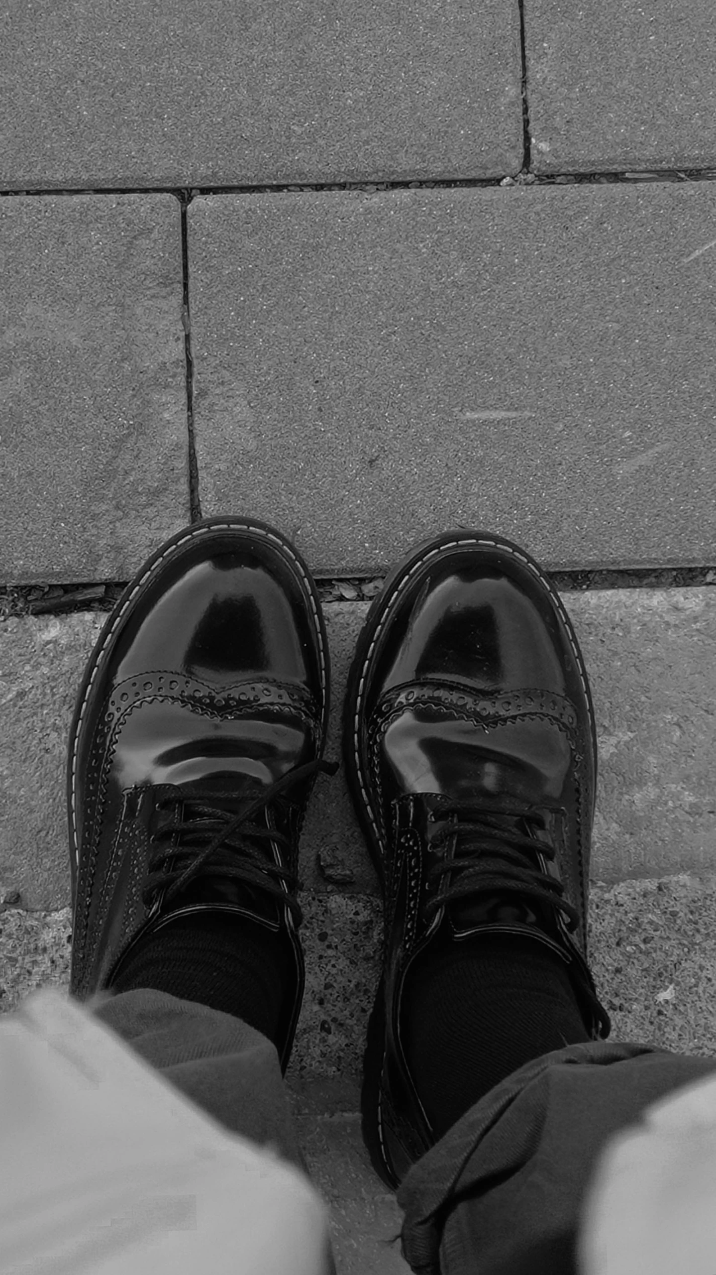 a black and white photo of a pair of shoes, a black and white photo, reddit, in empty!!!! legnica, profile picture, creepers, ready for a meeting