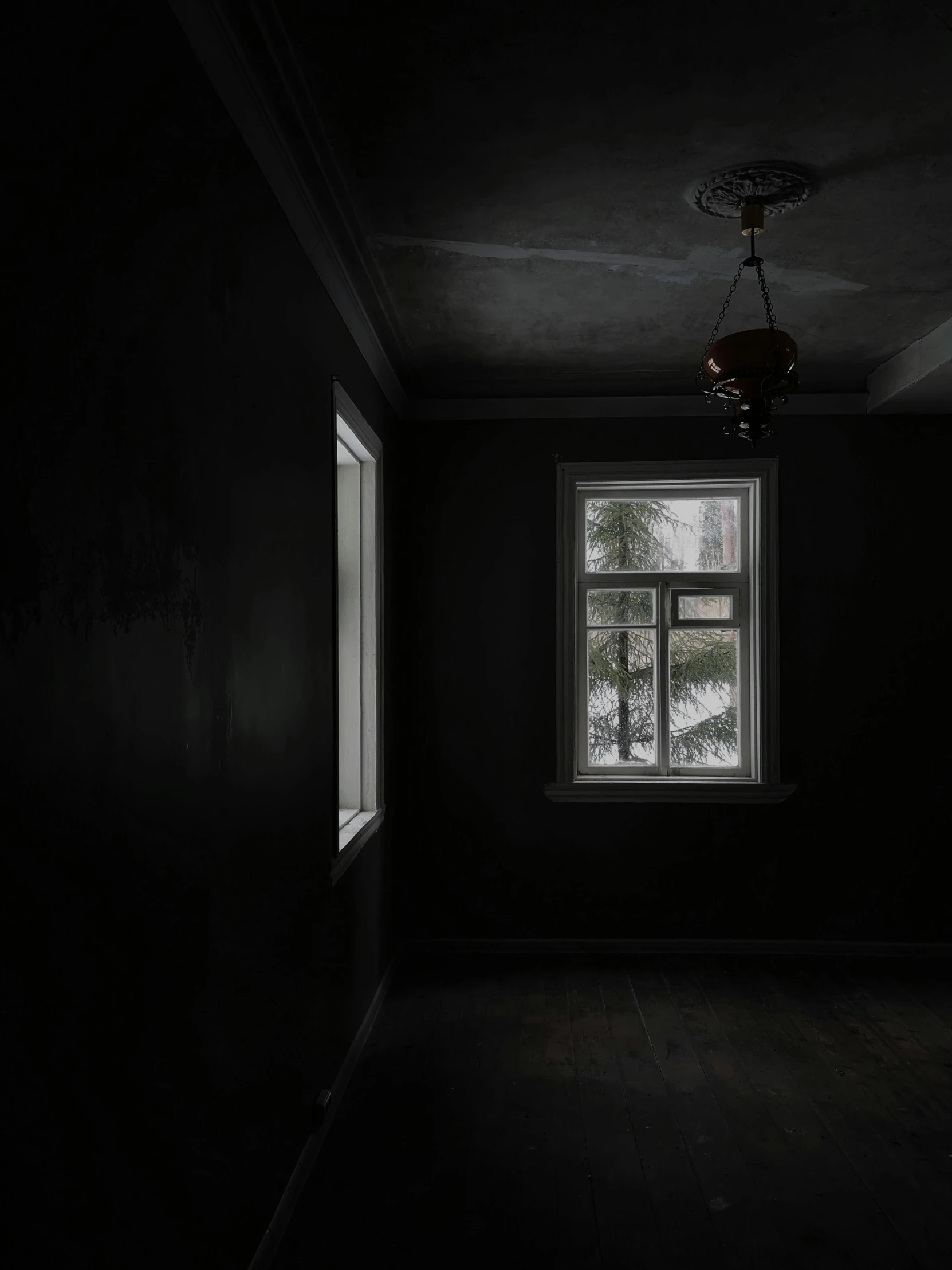 a dark room with a light shining in the window, inspired by Gregory Crewdson, unsplash contest winner, postminimalism, soviet interior, grey and dark theme, photo of scp-173, dark paint