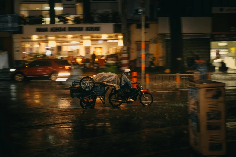 a couple of bikes that are sitting in the street, by Niko Henrichon, pexels contest winner, at evening during rain, wheelie, carriage, thumbnail