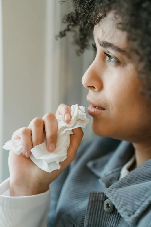 a close up of a person holding a napkin near a window, coughing, rip and tear, profile image, kids