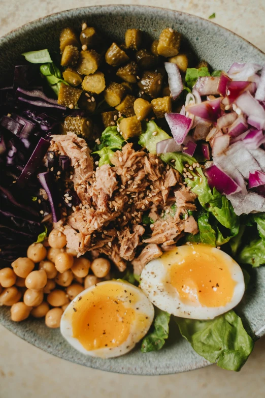 a close up of a bowl of food on a table, by Kristin Nelson, toga, highly upvoted, salad, pulled pork sandwich