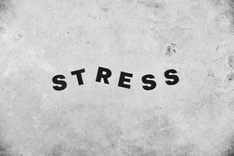 a black and white photo of the word stress, an album cover, concrete art style, stressful atmosphere, background image, business logo