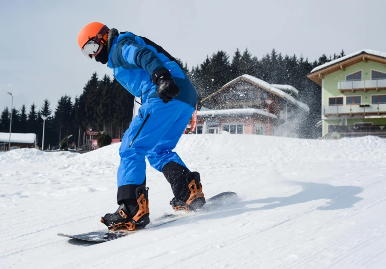 a man riding a snowboard down a snow covered slope, bixbite, avatar image, blippi, leisure activities