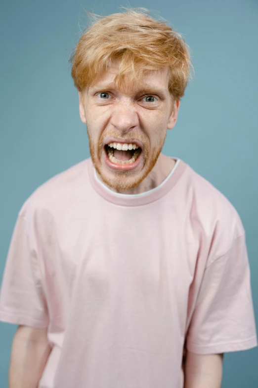 a man with a surprised look on his face, an album cover, inspired by Adriaen Hanneman, trending on pexels, ginger hair, screaming and sad, portrait of a pink gang, 15081959 21121991 01012000 4k