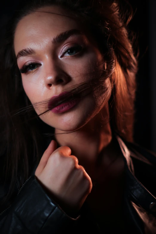 a woman in a leather jacket posing for a picture, by Adam Marczyński, trending on pexels, photorealism, evening makeup, light stubble, hailee steinfeld, contour light effect!! 8 k