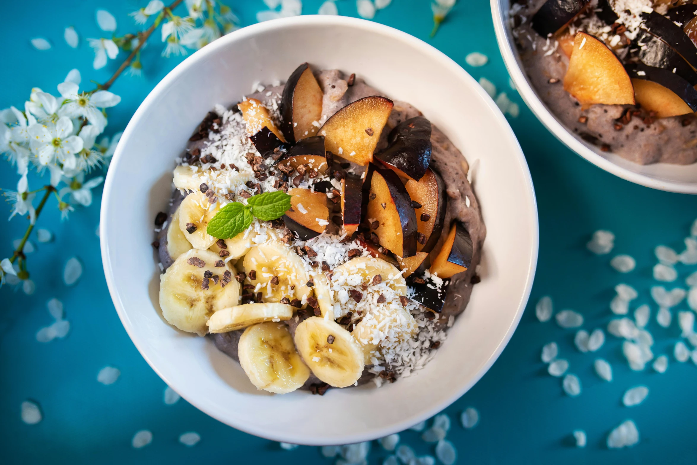 a close up of two bowls of food on a table, by Julia Pishtar, trending on unsplash, banana, purple, manuka, 🎀 🧟 🍓 🧚