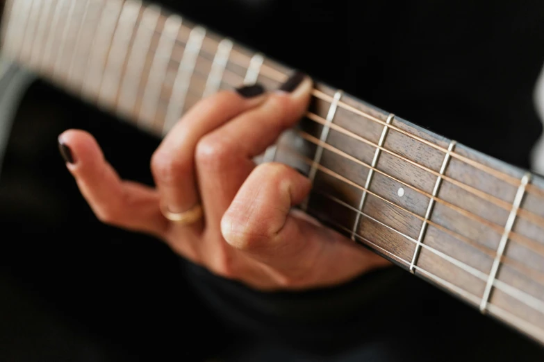 a close up of a person playing a guitar, by Gavin Hamilton, bard, extra high resolution, fiona staples, zoomed in shots