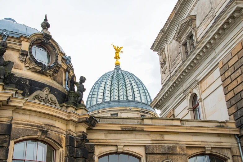 a large building with a dome on top of it, inspired by Friedrich Gauermann, pexels contest winner, stone and glass and gold, german, profile image, museum photo