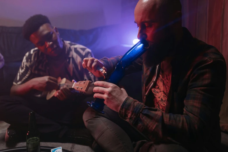 a group of men sitting on top of a couch next to each other, an album cover, by Ryan Pancoast, pexels contest winner, hurufiyya, smoking a magical bong, blue and purple vapor, playing a mandolin, close up portrait shot