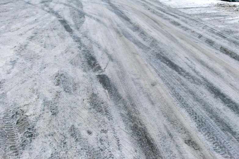 a man riding a snowboard down a snow covered slope, reddit, auto-destructive art, wet aslphalt road after rain, high resolution coal texture, fibres trial on the floor, expansive grand scale