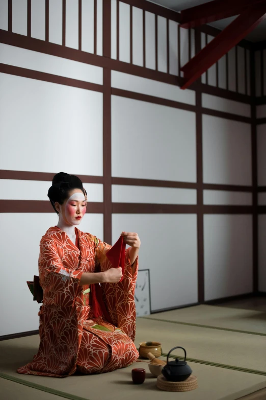 a woman in a kimono sitting on the floor, pexels contest winner, theater dressing room, square, shaking, ( ( theatrical ) )