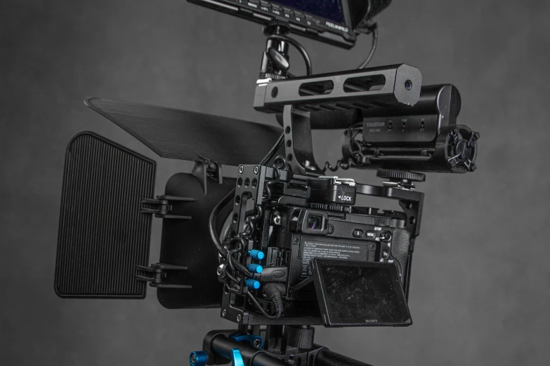 a close up of a camera on a tripod, apophysis av 8 k uhd, volumetric studio lighting, everything fits on the screen, rear-shot