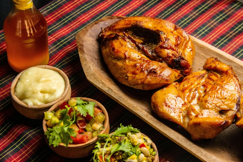 a close up of a plate of food on a table, by Carey Morris, hurufiyya, grilled chicken, chilean, background image, aztec