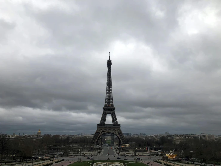 a view of the eiffel tower from the top of the tower, an album cover, pexels contest winner, surrealism, overcast gray skies, reuters, ap news photograph, grey sky