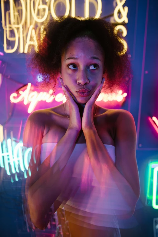 a woman standing in front of neon signs, inspired by David LaChapelle, pexels contest winner, afrofuturism, nathalie emmanuel, light skin, colorful signs, bisexual lighting