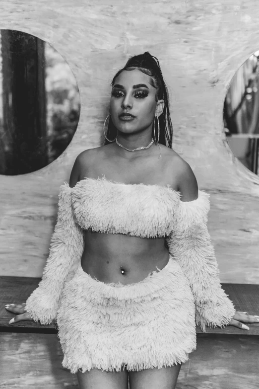 a black and white photo of a woman posing for a picture, wearing a crop top, new song, sara ali, ashy