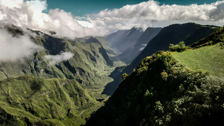 a view of a valley from the top of a mountain, pexels contest winner, les nabis, reunion island, slide show, conde nast traveler photo, ilustration