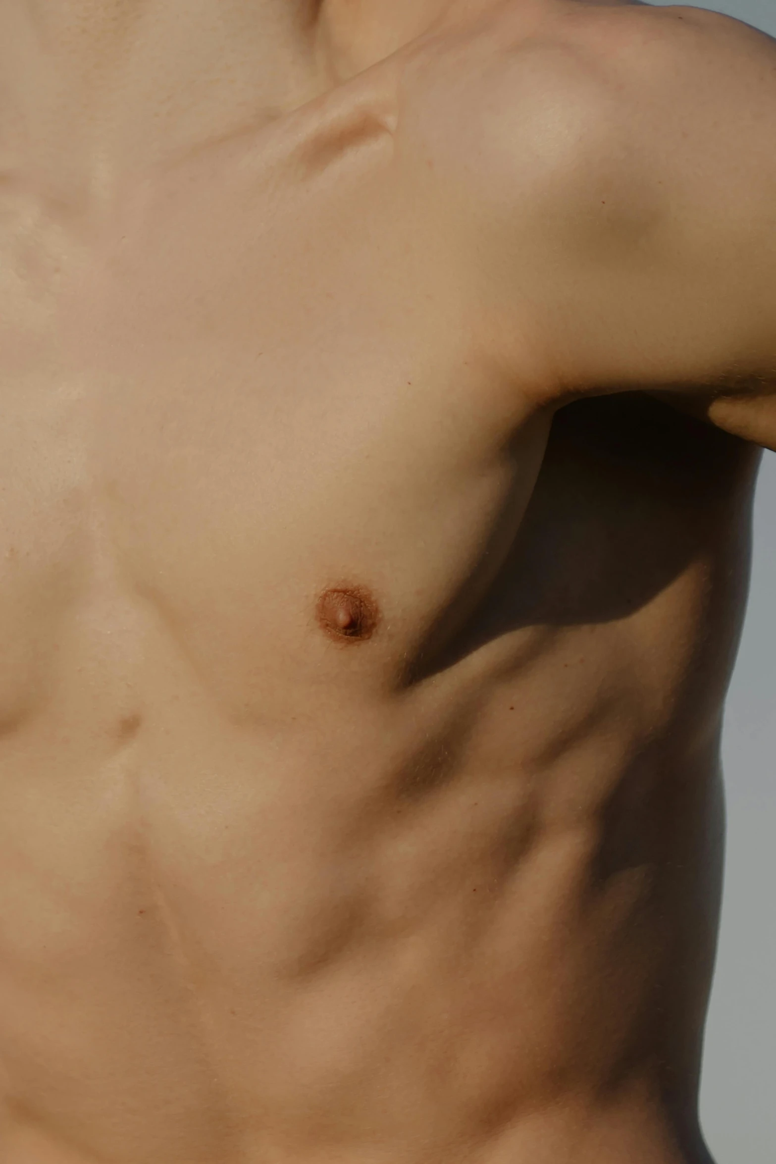 a close up of a shirtless man holding a frisbee, unsplash, happening, realistic flesh texture, neckline, square, wonbin lee