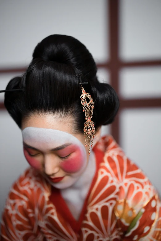 a close up of a woman in a kimono, inspired by Uemura Shōen, trending on unsplash, with dark hair tied up in a bun, square, noh theatre mask, pose 4 of 1 6