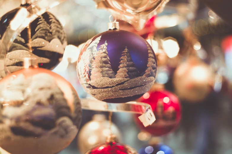 a bunch of christmas ornaments hanging from a ceiling, by Julia Pishtar, pexels, snowglobe, avatar image, brown, profile image