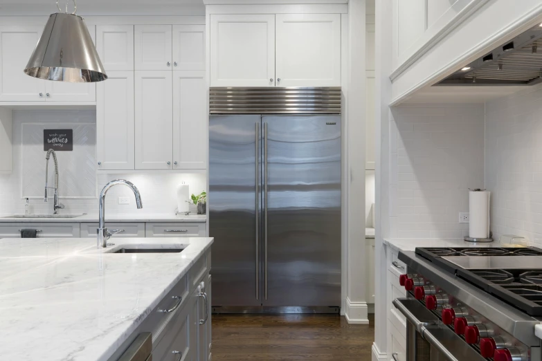 a kitchen with stainless steel appliances and white cabinets, pexels contest winner, freezing, panels, thumbnail, super high resolution