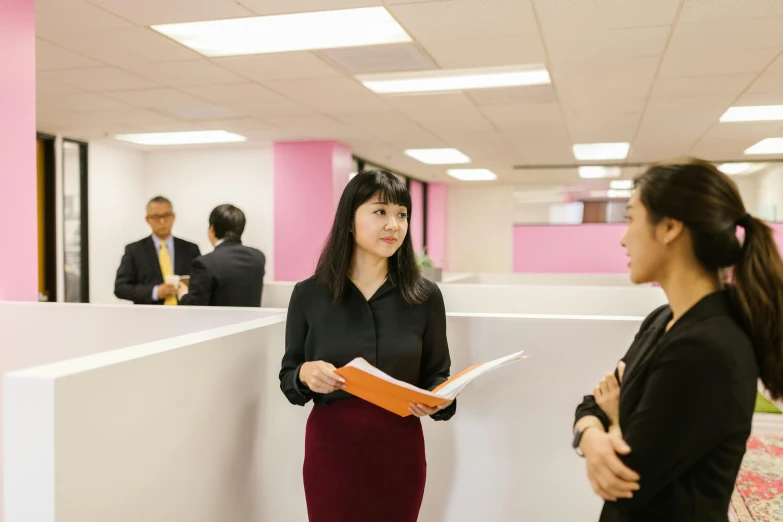 a couple of women standing next to each other in a room, unsplash, gutai group, office cubicles, itsuko azuma, profile image, uhq