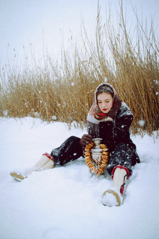 a person that is sitting in the snow, an album cover, inspired by Chen Yifei, instagram, profile image, award winning autochrome photo, kiko mizuhara, holiday season
