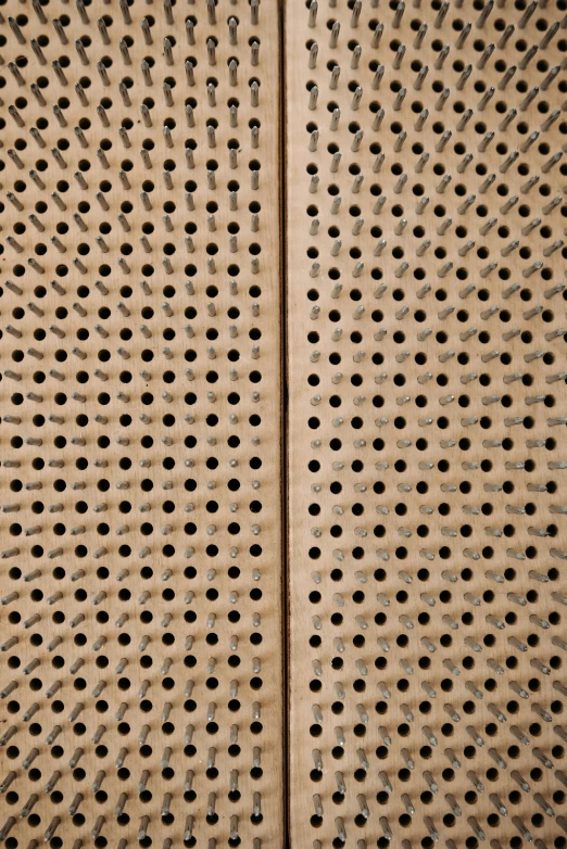 a close up of a metal grater with holes, by Jakob Emanuel Handmann, interior wood, 2 5 6 x 2 5 6, large hadron collider, pattern