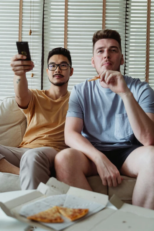 a couple of men sitting on top of a couch, trending on reddit, everything fits on the screen, asian male, julian ope, game ready