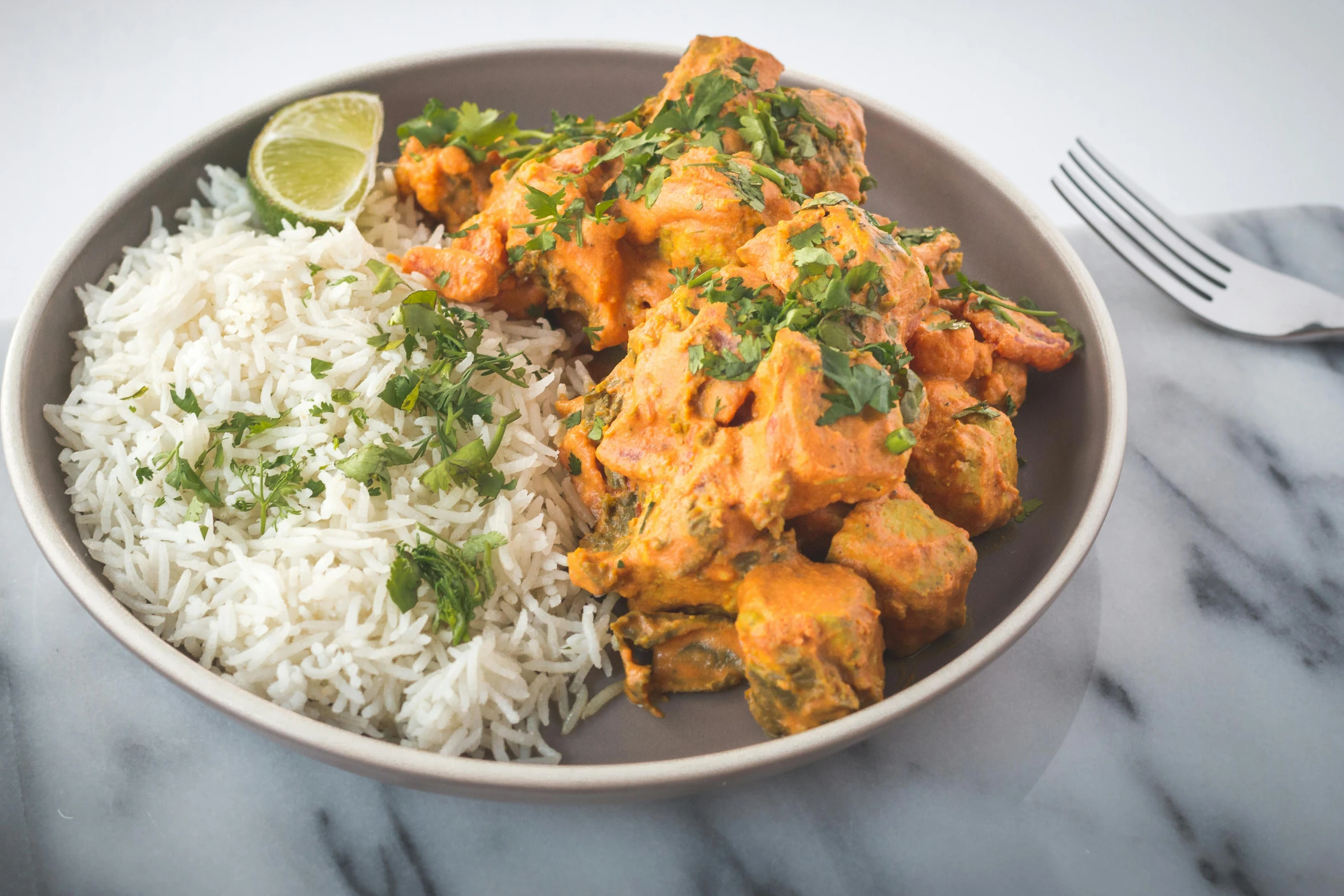 a close up of a plate of food with rice, inspired by John Steuart Curry, unsplash, hurufiyya, square, chicken, slate, creamy