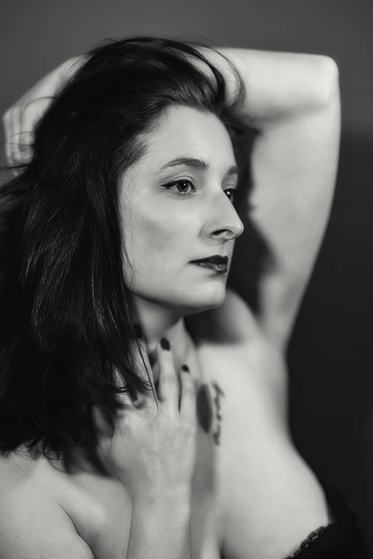 a black and white photo of a woman in lingerie, a black and white photo, inspired by Man Ray, reddit, renaissance, halfbody headshot, jill stingray, hands in her hair, carice van houten