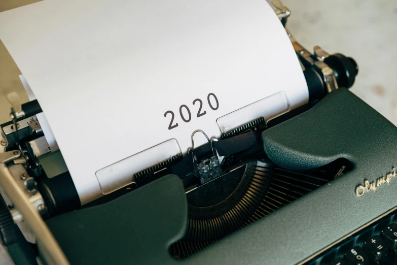 a close up of a typewriter with a sheet of paper on it, an album cover, trending on pexels, private press, year 2 0 4 0, near future 2 0 3 0, avatar image, thumbnail