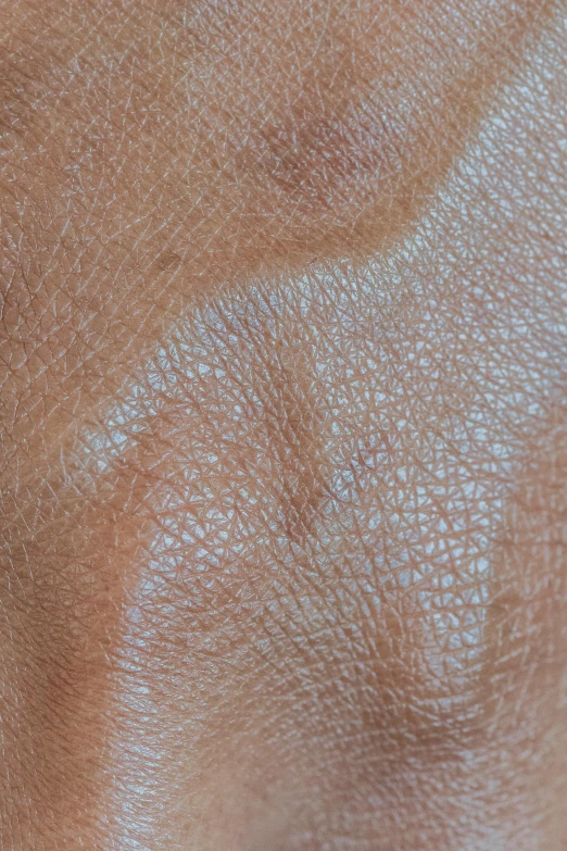 a close up of the skin of a person's hand, trending on reddit, natural skin tone 4k textures, detailed product image, silicone skin, pearlescent skin