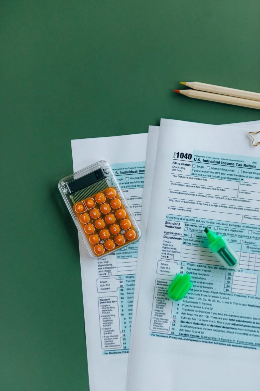 a green table topped with papers and a calculator, a cartoon, by Carey Morris, trending on pexels, 8k octan photo, multi-part, thumbnail