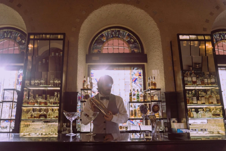 a man that is standing in front of a bar, pexels contest winner, renaissance, inside a grand, old fashioned, panoramic shot, avatar image