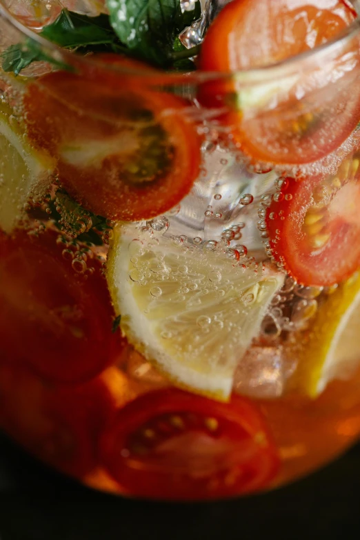 a pitcher filled with sliced tomatoes and lemons, pexels, process art, rum, bottom body close up, salad, multiple stories