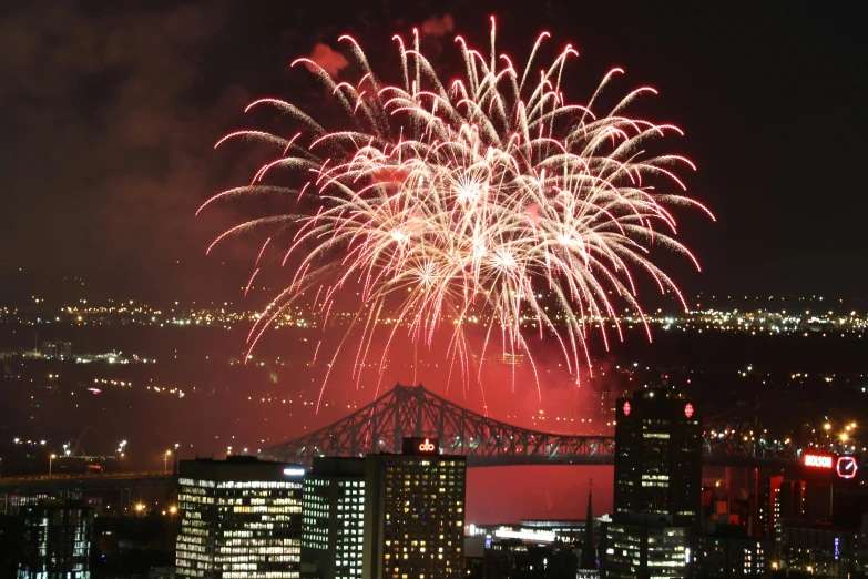 fireworks light up the night sky over a city, a photo, by Clément Serveau, montreal, ap photo, ultra 4k, coronation