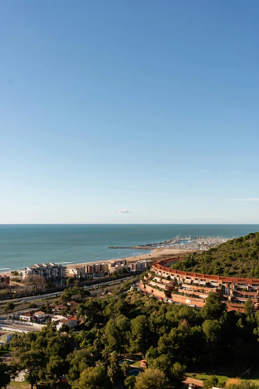a view of the ocean from the top of a hill, renaissance, barcelona, epic ultrawide shot, apartment, today\'s featured photograph 4k