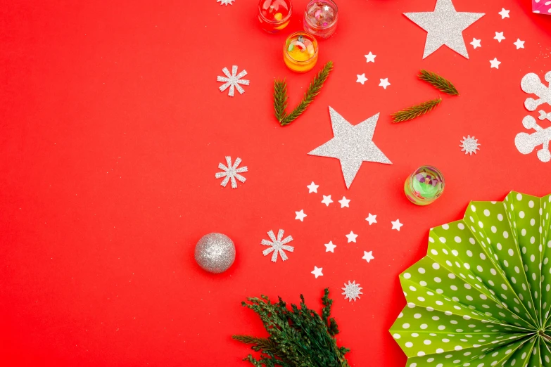 christmas decorations on a red background, by Julia Pishtar, colorful stars, background image, knolling, thumbnail