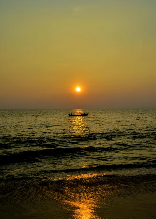 a boat floating on top of a body of water, by Sudip Roy, pexels contest winner, romanticism, sunset panorama, yellow, slide show, serene beach setting