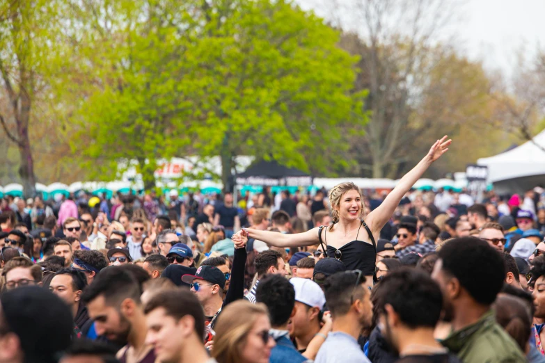 a crowd of people at a music festival, an album cover, pexels, happening, caulfield, spring day, rapper, park in background